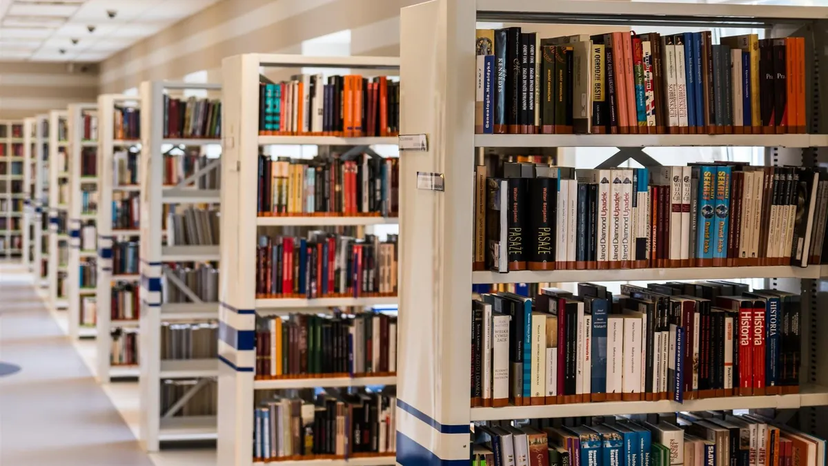Rows of books in a university library